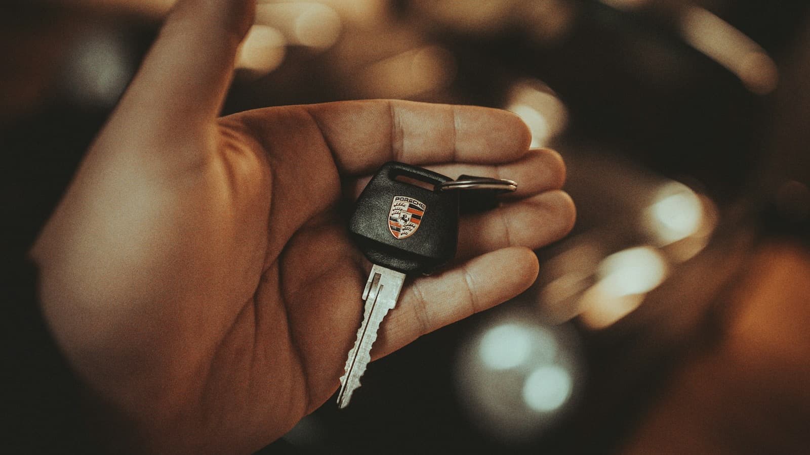 ID Locksmith technician programming a replacement car key